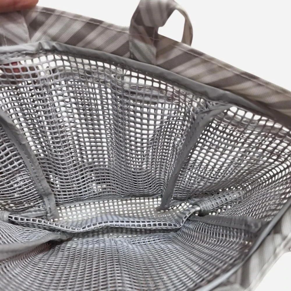 Grey striped mesh shower caddy with clear bottom